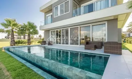 Casa em condomínio fechado com 5 quartos à venda na rua rio jacuí, 1331, centro, xangri-lá, 415 m2 por r$ 5.400.000