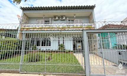 Casa com 3 quartos à venda na Rua Arnaldo Ballve, 555, Jardim Itu Sabará, Porto Alegre, 292 m2 por R$ 960.000