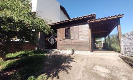 Casa com 3 quartos à venda na Rua Professora Ziláh Totta, 521, Jardim Leopoldina, Porto Alegre, 57 m2 por R$ 250.000