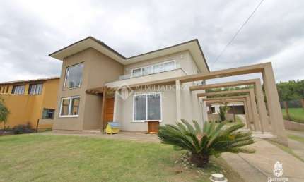 Casa em condomínio fechado com 3 quartos à venda na Estrada dos Guterres, 2565, Fiuza, Viamão, 391 m2 por R$ 1.000.000