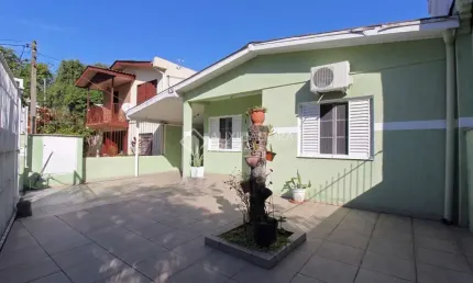 Casa com 3 quartos à venda na Rua Monte Flor, 141, Jardim Floresta, Porto Alegre, 150 m2 por R$ 900.000