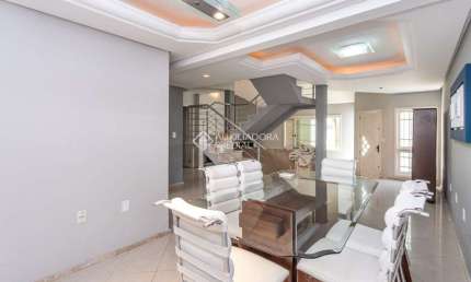 Casa com 4 quartos à venda na Rua Maria Elaine Wotter, 75, Rubem Berta, Porto Alegre, 315 m2 por R$ 639.000