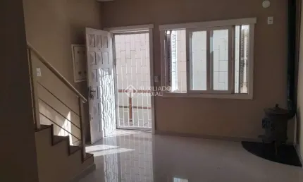 Casa em condomínio fechado com 3 quartos à venda na Rua Erechim, 1001, Nonoai, Porto Alegre, 100 m2 por R$ 380.000