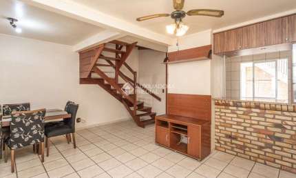 Casa em condomínio fechado com 3 quartos à venda na Avenida João Ferreira Jardim, 140, Parque Santa Fé, Porto Alegre, 116 m2 por R$ 499.000