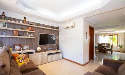 Casa com 3 quartos à venda na Rua Paulino Chaves, 109, Santo Antônio, Porto Alegre, 263 m2 por R$ 1.180.000