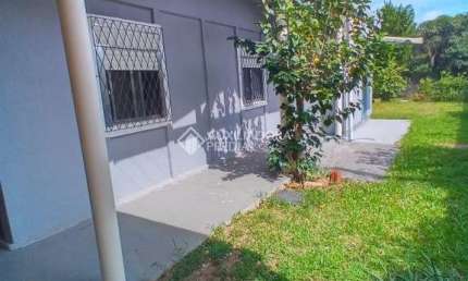 Casa com 3 quartos à venda na Siqueira Campos, 300, Stella Maris, Alvorada, 155 m2 por R$ 650.000