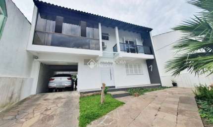 Casa em condomínio fechado com 3 quartos à venda na Rua Comendador Albino Cunha, 261, Cristo Redentor, Porto Alegre, 240 m2 por R$ 1.100.000