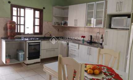 Casa com 3 quartos à venda na Rua Anhumas, 112, Jardim Algarve, Alvorada, 110 m2 por R$ 250.000