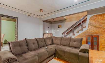 Casa com 4 quartos à venda na Rua Alcides Cunha, 37, Partenon, Porto Alegre, 259 m2 por R$ 350.000