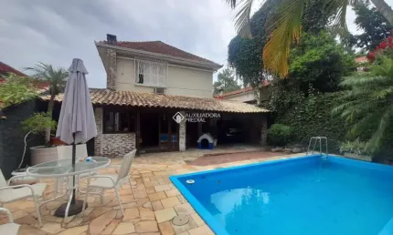 Casa em condomínio fechado com 4 quartos à venda na Rua Camerino, 152, Petrópolis, Porto Alegre, 390 m2 por R$ 1.650.000