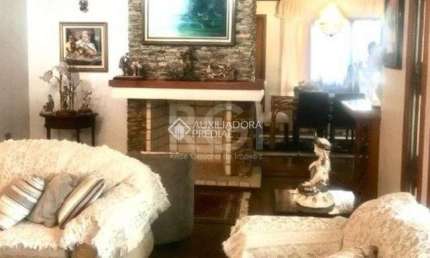 Casa com 5 quartos à venda na Avenida General Barreto Viana, 329, Chácara das Pedras, Porto Alegre, 550 m2 por R$ 1.800.000