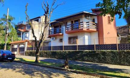 Casa em condomínio fechado com 4 quartos à venda na Rua Batista Xavier, 146, Partenon, Porto Alegre, 240 m2 por R$ 845.500