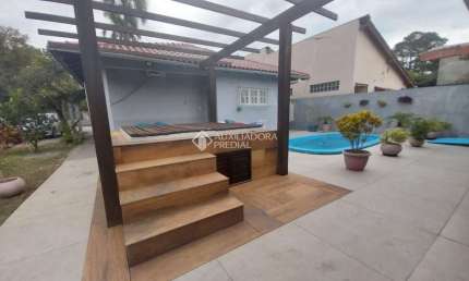 Casa em condomínio fechado com 2 quartos à venda na Avenida Independência, 395, Flórida, Guaíba, 205 m2 por R$ 760.000