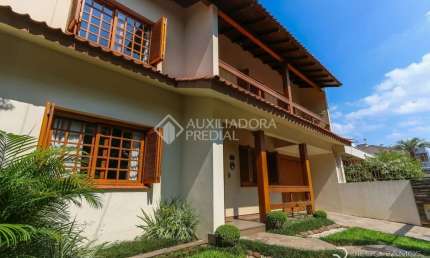 Casa em condomínio fechado com 3 quartos à venda na Rua Paulo Bento Lobato, 221, Jardim Lindóia, Porto Alegre, 340 m2 por R$ 1.090.000