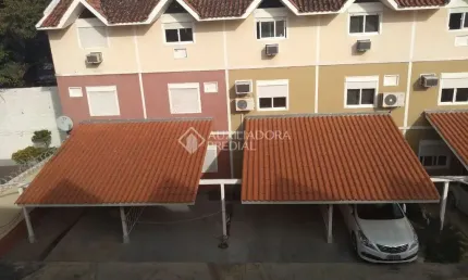 Casa em condomínio fechado com 3 quartos à venda na Rua Afonso Arinos, 145, Camaquã, Porto Alegre, 94 m2 por R$ 360.000