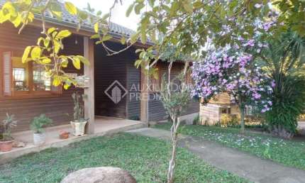 Casa em condomínio fechado com 3 quartos à venda na Rua Maurílio Ferreira, 370, Campo Novo, Porto Alegre, 200 m2 por R$ 310.000