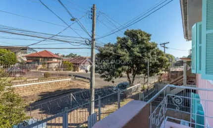 Casa com 4 quartos à venda na Rua Nossa Senhora da Medianeira, 4, Medianeira, Porto Alegre, 165 m2 por R$ 560.000
