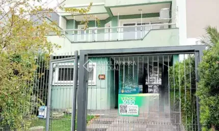 Casa em condomínio fechado com 3 quartos à venda na Rua Canísio Binsfeld, 341, Hípica, Porto Alegre, 210 m2 por R$ 830.000