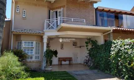 Casa em condomínio fechado com 2 quartos à venda na Rua Guatambu, 597, Hípica, Porto Alegre, 128 m2 por R$ 628.000