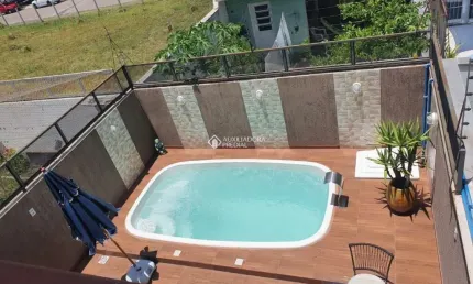 Casa em condomínio fechado com 3 quartos à venda na Rua Aldo Sani, 164, Hípica, Porto Alegre, 144 m2 por R$ 729.900