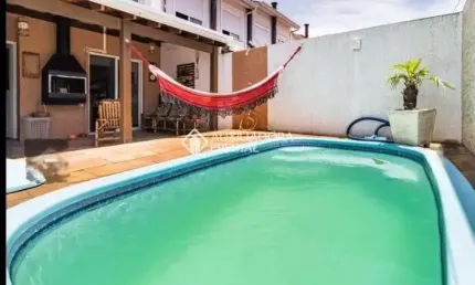 Casa em condomínio fechado com 3 quartos à venda na AVENIDA EDGAR PIRES DE CASTRO - DE 1740 A 2238 - L, 2520, Hípica, Porto Alegre, 83 m2 por R$ 408.000