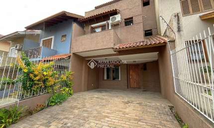 Casa com 3 quartos à venda na Rua Helio Felix Frey, 162, Espírito Santo, Porto Alegre, 125 m2 por R$ 540.000