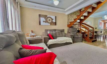 Casa em condomínio fechado com 3 quartos à venda na Avenida Edgar Pires de Castro, 2520, Hípica, Porto Alegre, 144 m2 por R$ 359.000