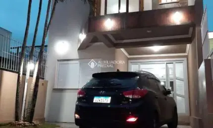 Casa com 3 quartos à venda na Rua Luzinete Alves Aragon, 528, Hípica, Porto Alegre, 173 m2 por R$ 748.000