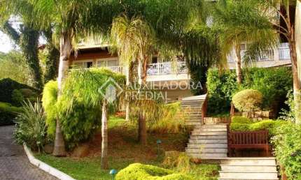 Casa em condomínio fechado com 3 quartos à venda na Rua Professor Xavier Simões, 495, Tristeza, Porto Alegre, 208 m2 por R$ 1.450.000