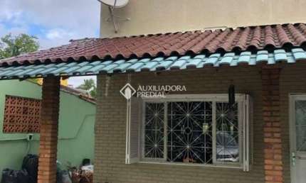 Casa com 3 quartos à venda na Avenida Ararangua, 151, Guarujá, Porto Alegre, 236 m2 por R$ 600.000