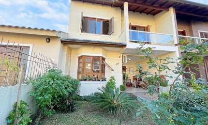 Casa em condomínio fechado com 3 quartos à venda na Rua Pau Brasil, 509, Hípica, Porto Alegre, 149 m2 por R$ 540.000