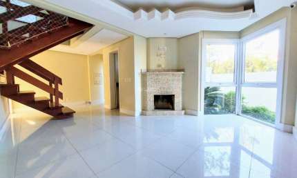 Casa em condomínio fechado com 3 quartos à venda na Rua Doutor Arnaldo da Silva Ferreira, 465, Jardim Isabel, Porto Alegre, 290 m2 por R$ 1.399.000