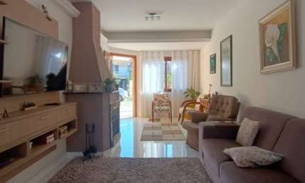 Casa com 3 quartos à venda na Rua Edgar Sanches Laurent, 46, Hípica, Porto Alegre, 180 m2 por R$ 750.000