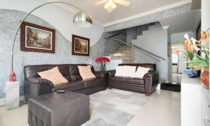 Casa em condomínio fechado com 3 quartos à venda na Rua Pau Brasil, 437, Hípica, Porto Alegre, 162 m2 por R$ 740.000