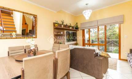 Casa em condomínio fechado com 3 quartos à venda na Rua Jamil Antônio José, 46, Nonoai, Porto Alegre, 145 m2 por R$ 555.000