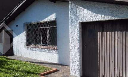 Casa com 3 quartos à venda na Rua Gabriel Mascarello, 104, Teresópolis, Porto Alegre, 200 m2 por R$ 450.000
