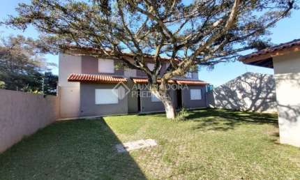 Casa em condomínio fechado com 2 quartos à venda na Rua Santa Mônica, 404, Ponta Grossa, Porto Alegre, 65 m2 por R$ 235.000