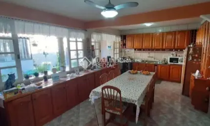 Casa com 3 quartos à venda na Avenida Orleaes, 744, Guarujá, Porto Alegre, 318 m2 por R$ 600.000