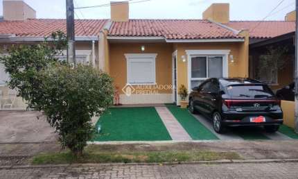 Casa em condomínio fechado com 2 quartos à venda na Rua Embira, 170, Hípica, Porto Alegre, 52 m2 por R$ 318.000