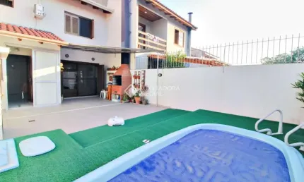 Casa em condomínio fechado com 3 quartos à venda na Rua Edgar Sanches Laurent, 77, Hípica, Porto Alegre, 124 m2 por R$ 569.000