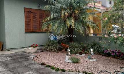 Casa com 3 quartos à venda na Rua Heitor Kramer, 321, Guarujá, Porto Alegre, 114 m2 por R$ 599.000