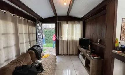 Casa em condomínio fechado com 2 quartos à venda na Avenida Guarujá, 156, Guarujá, Porto Alegre, 150 m2 por R$ 404.000