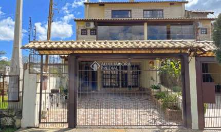 Casa com 4 quartos à venda na Rua Doutor Egydio Michaelsen, 58, Cavalhada, Porto Alegre, 202 m2 por R$ 655.000