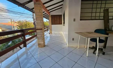 Casa com 5 quartos à venda na Rua Catarina Quadros, 39, Hípica, Porto Alegre, 204 m2 por R$ 400.000