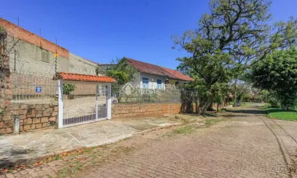 Casa com 3 quartos à venda na Avenida Felipe Weimann, 58, Santa Tereza, Porto Alegre, 120 m2 por R$ 450.000