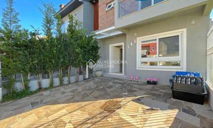 Casa em condomínio fechado com 3 quartos à venda na Rua Aldo Sani, 143, Hípica, Porto Alegre, 127 m2 por R$ 699.000