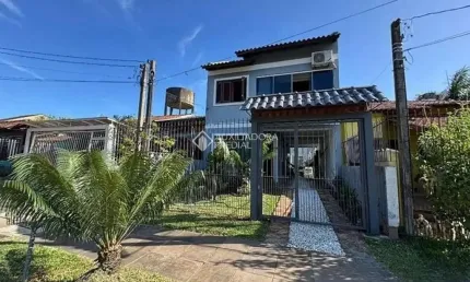 Casa com 3 quartos à venda na Rua Baldoino Bottini, 733, Hípica, Porto Alegre, 99 m2 por R$ 550.000