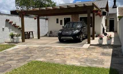 Casa com 3 quartos à venda na Rua Stringhini, 99, Hípica, Porto Alegre, 154 m2 por R$ 595.000