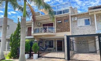 Casa com 3 quartos à venda na Rua Guatambu, 618, Hípica, Porto Alegre, 254 m2 por R$ 790.000