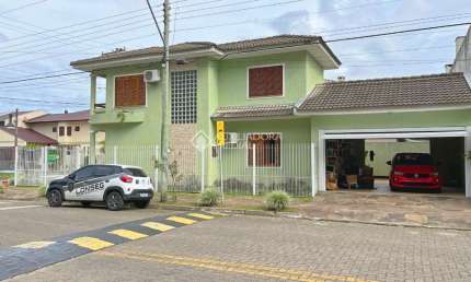 Casa com 3 quartos à venda na Rua Álamo, 11, Hípica, Porto Alegre, 174 m2 por R$ 1.100.000